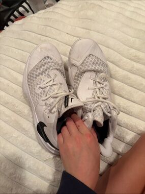 Nike White Athletic Sneakers with Black Swoosh